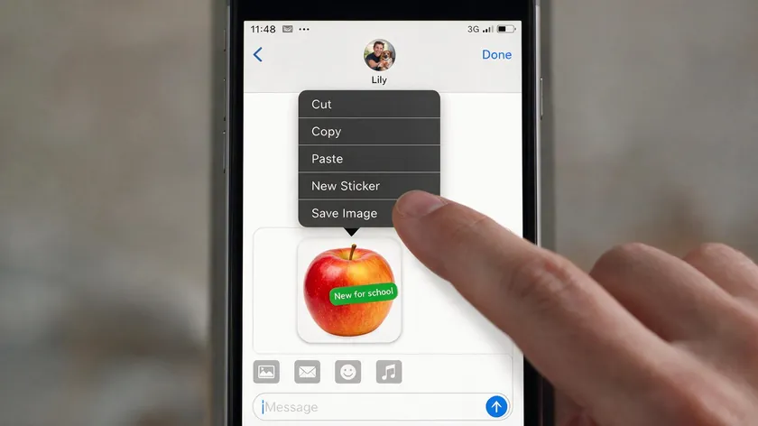 An iPhone Messages app showing a lifted image pasted as a sticker with the Save Image option to erase background in a photo on iPhone.